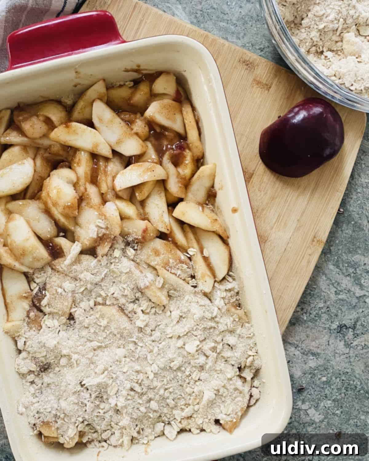 Spiced Apple Crumb Bars 7 Baking dish with unbaked apple oat bars.