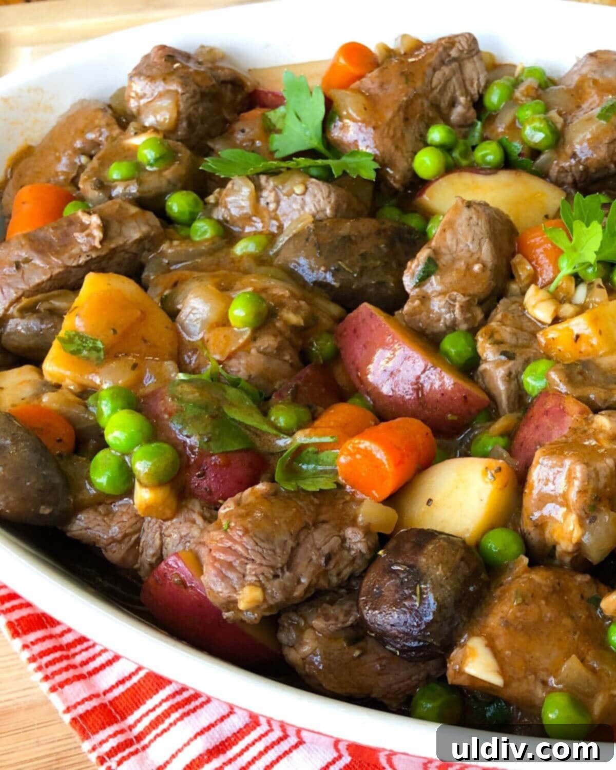 Beef Tenderloin, Mushroom & Potato Stew 4 A close-up view of the rich, savory beef tenderloin stew in a bowl, highlighting the tender beef and vibrant vegetables.