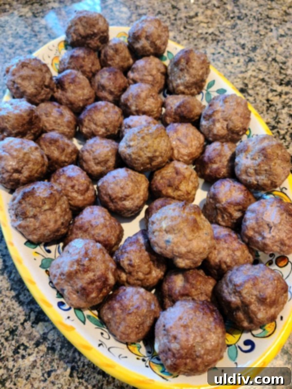 Trompe L'oeil Meatballs: Unmasking the Bison 6 Hands rolling ground bison mixture into small, truffle-like balls