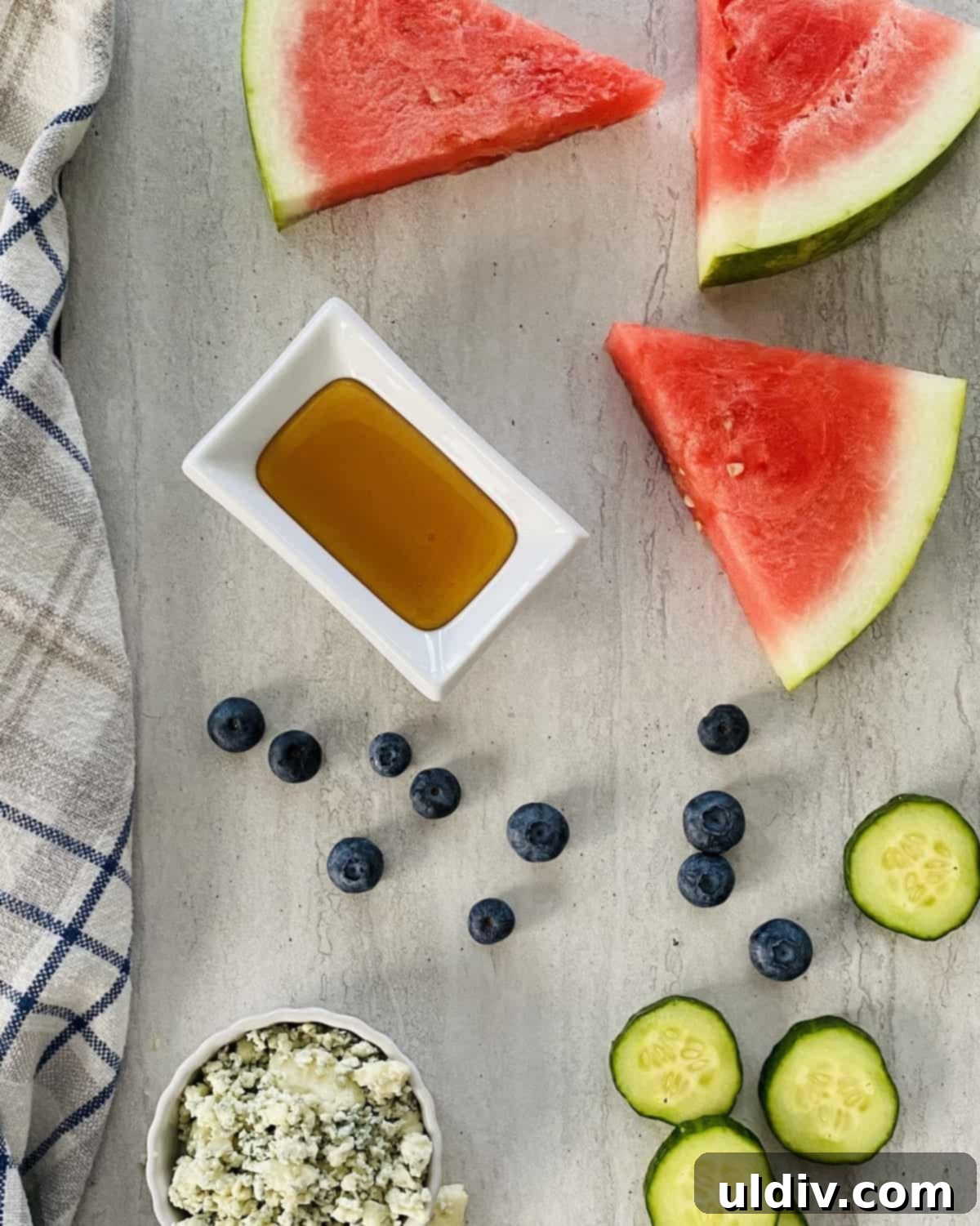 Watermelon Cucumber Blue Cheese Poppers 3 melon wedges, blueberries, blue cheese, cucumber rounds and honey