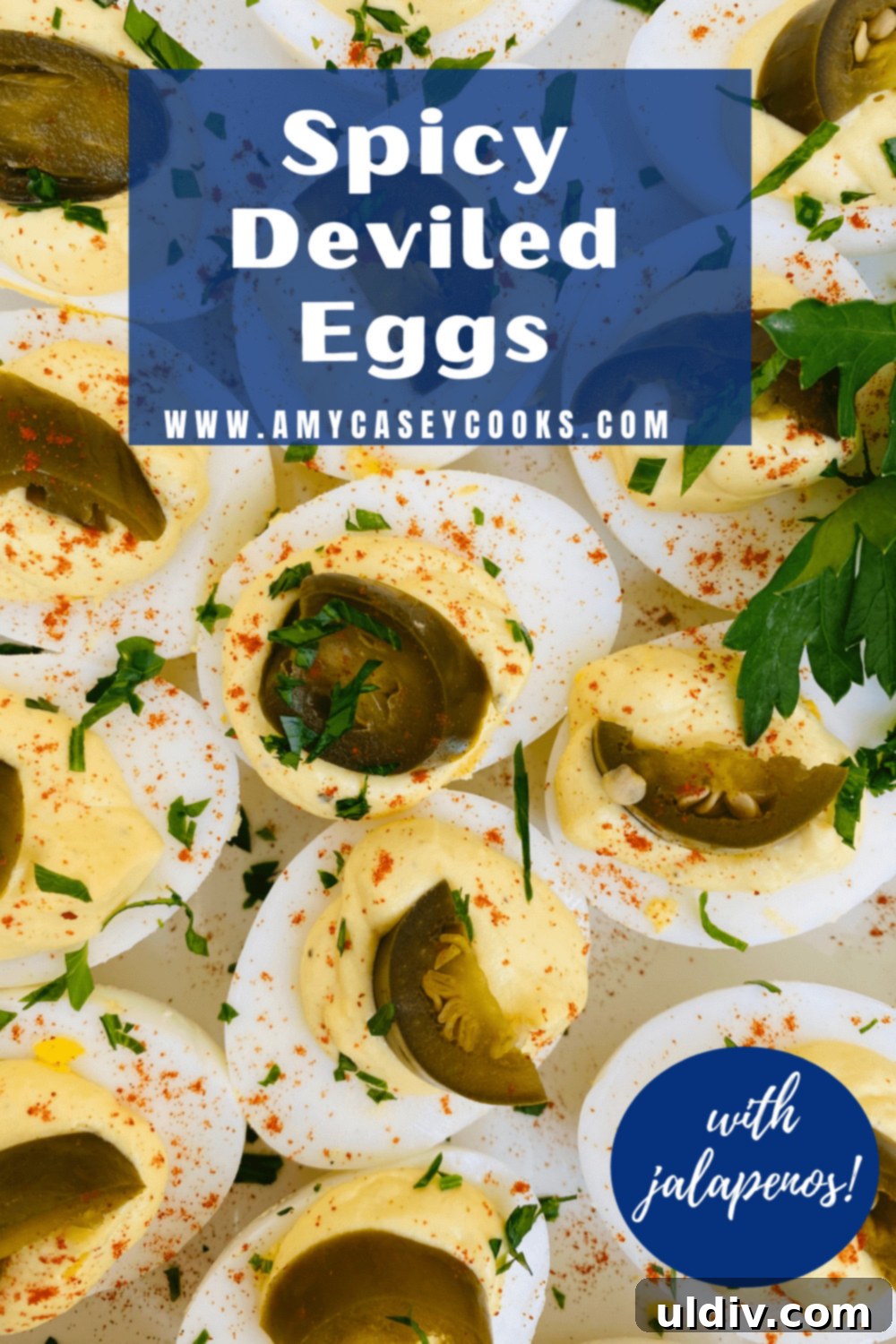 Jalapeno Fire Deviled Eggs 8 A close-up shot of creamy and spicy deviled eggs, beautifully topped with bright red pickled jalapeño peppers and a dusting of smoked paprika, ready for a festive gathering.