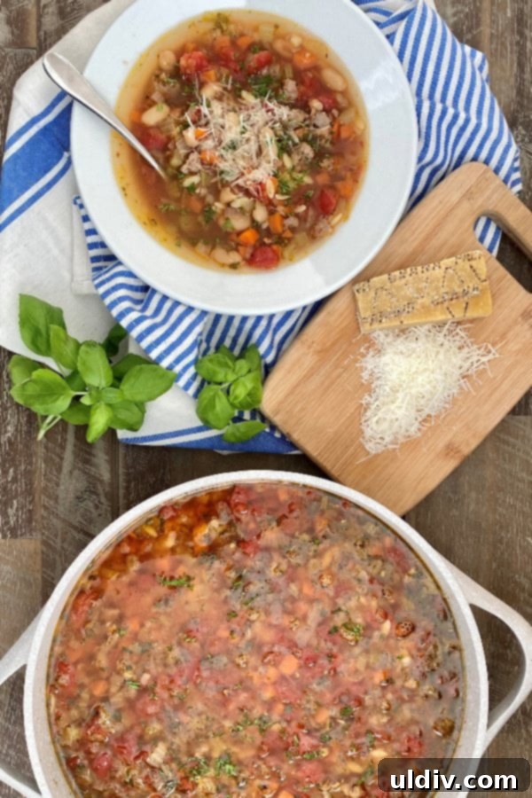 Effortless and Mouthwatering Pasta e Fagioli 5 bowl and pot of pasta soup with Italian sausage and vegetables