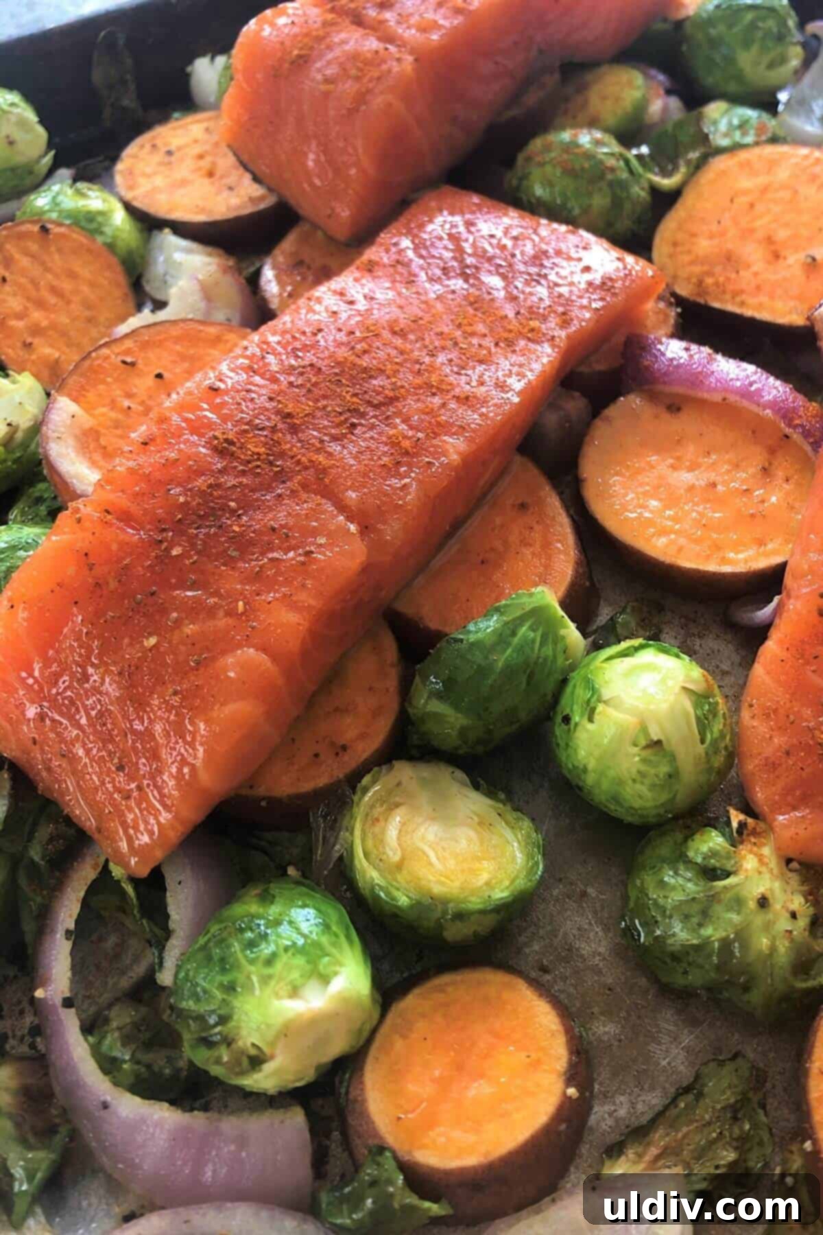 One-Pan Maple Salmon with Roasted Sweet Potatoes and Brussels Sprouts 6 Old Bay seasoning on salmon.