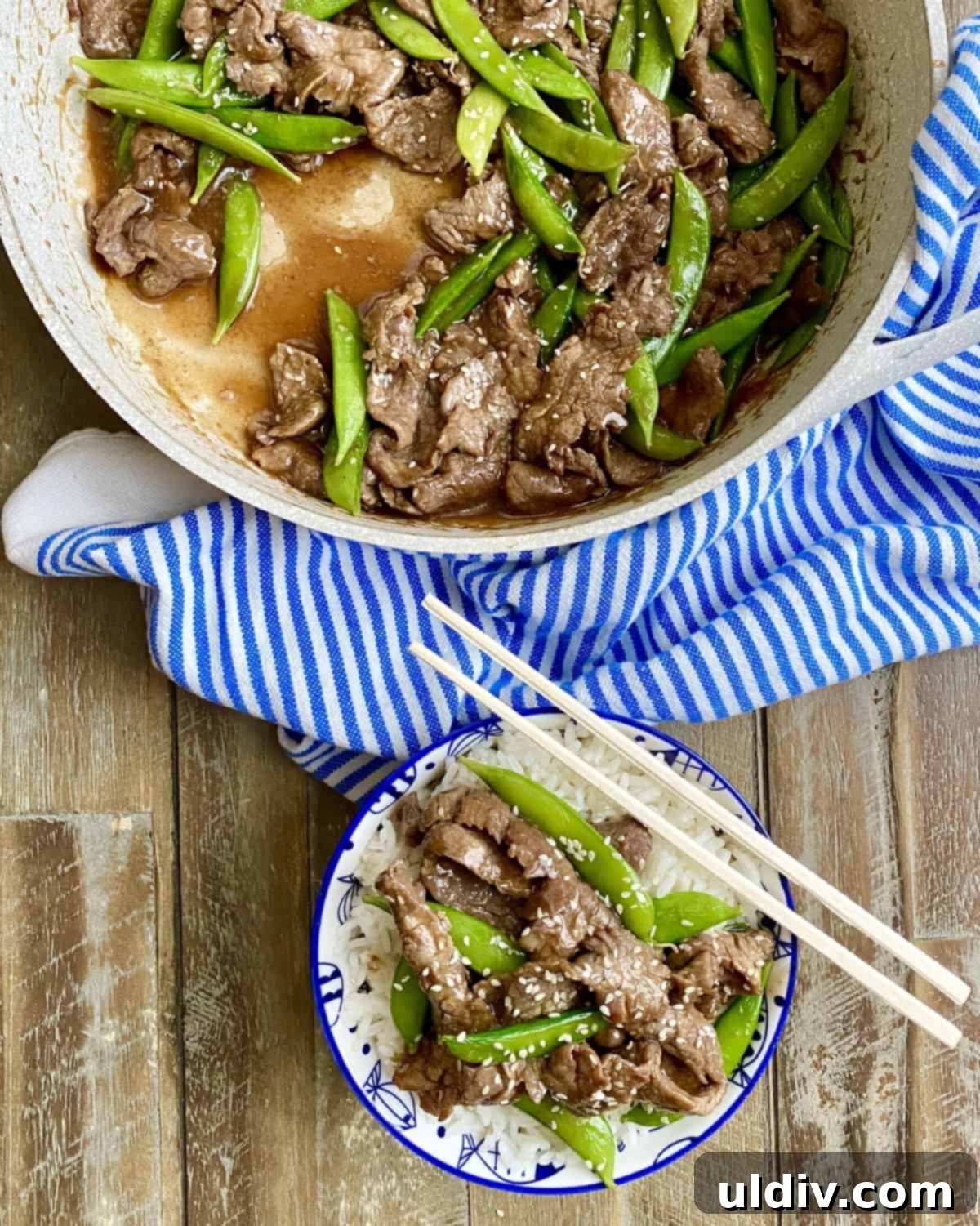 beef stir fry recipe in pan and a single serving