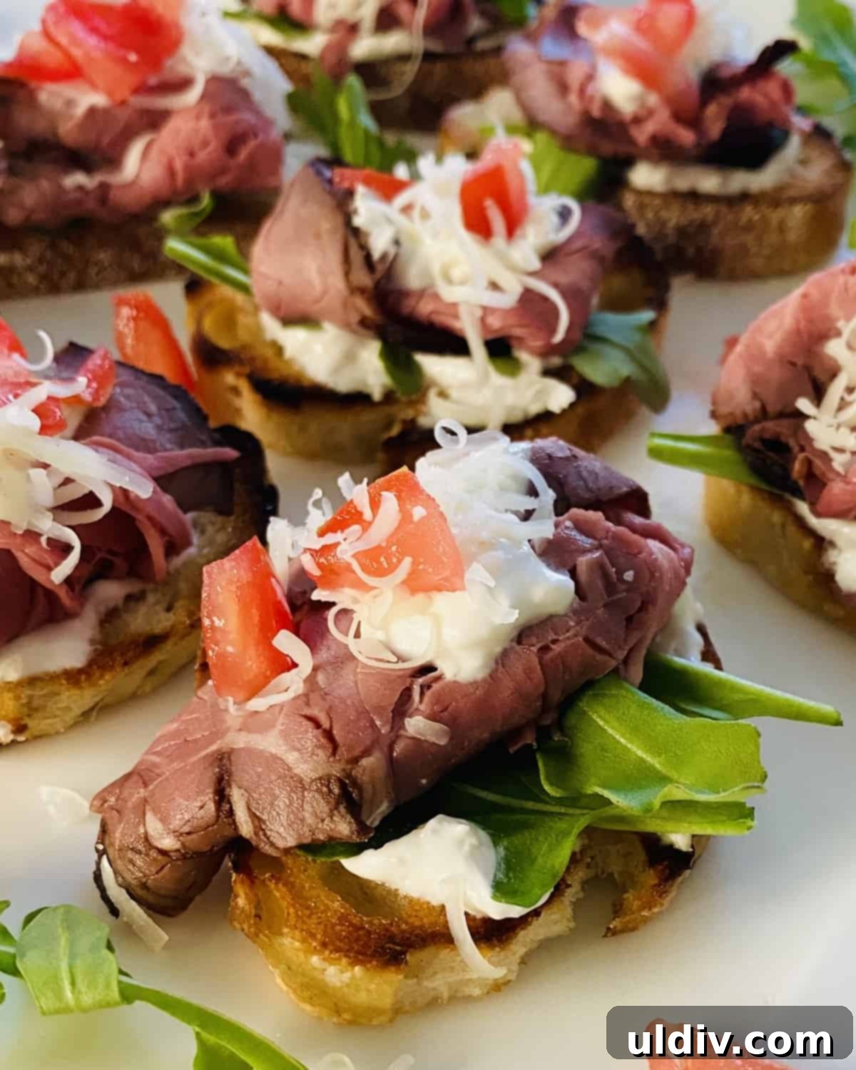 Zesty Roast Beef Crostini 2 crostini topped with roast beef