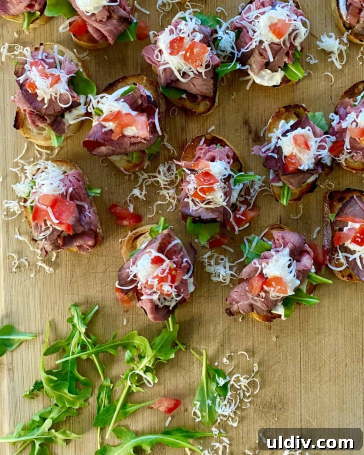 Zesty Roast Beef Crostini 7 bread topped with horseradish cream and roast beef