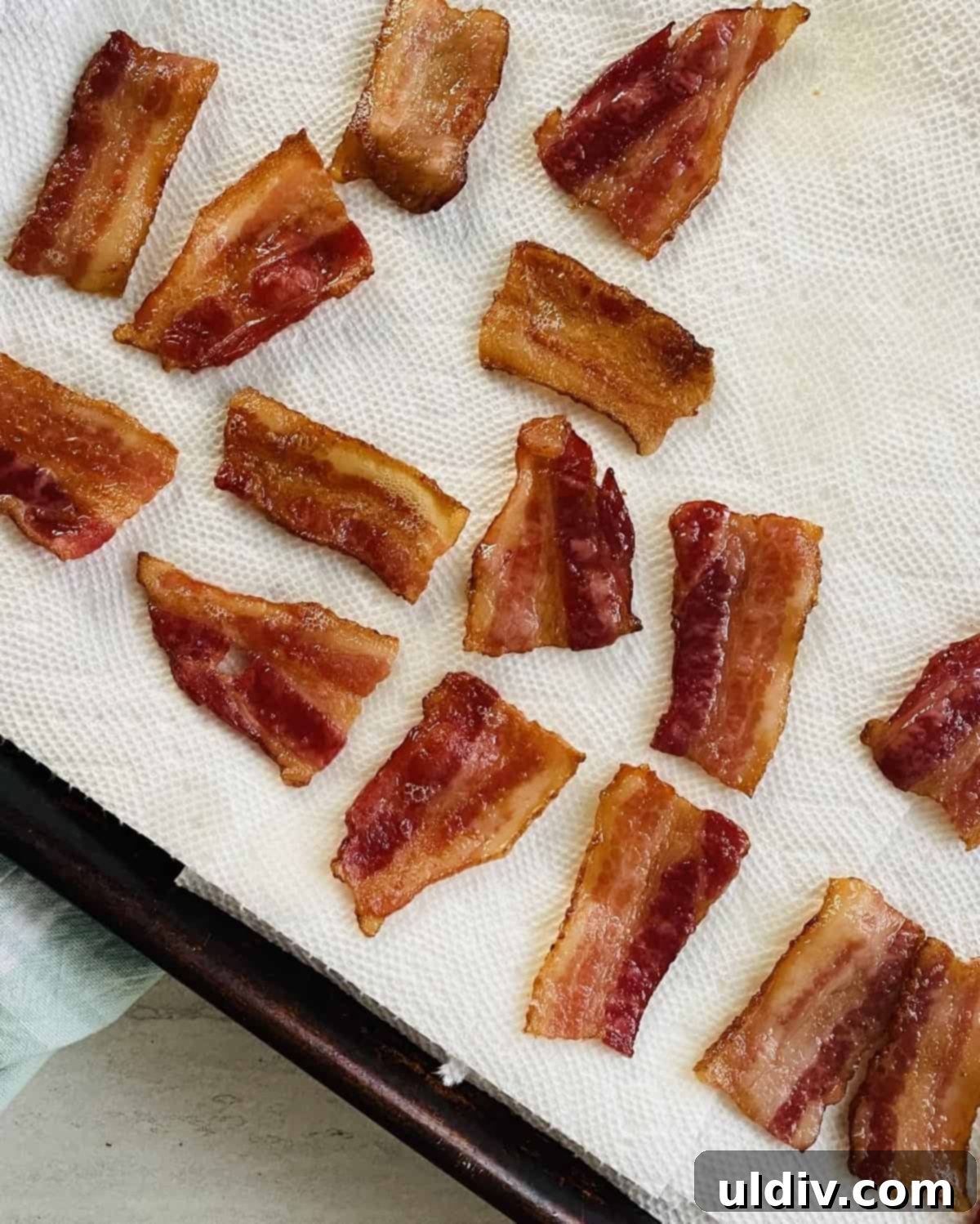 Bite-Sized BLT Sandwiches 7 Draining grease of small pieces of bacon on paper towels.