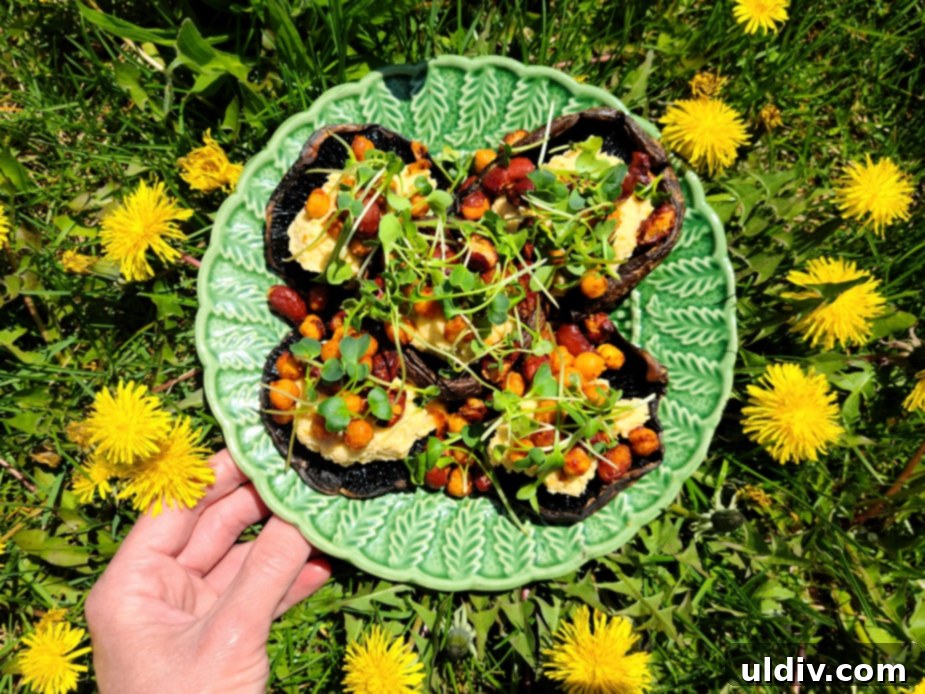 Air fried portobello mushrooms stuffed with hummus and chickpeas, topped with radish microgreens.