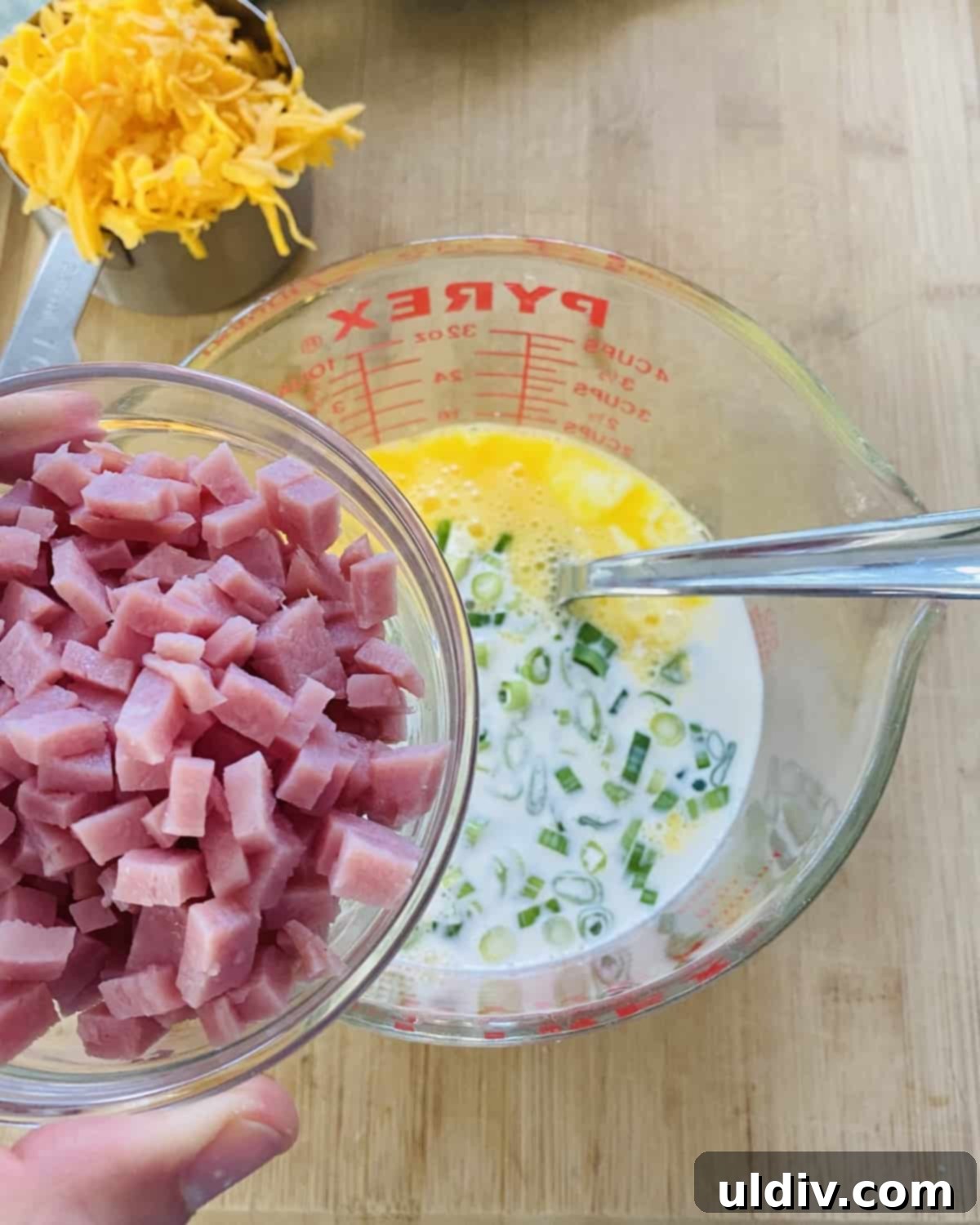 Golden Hash Brown Quiche: Ham and Cheese Delight 7 A bowl of diced ham next to the quiche filling mixture, showcasing the rich ingredients.