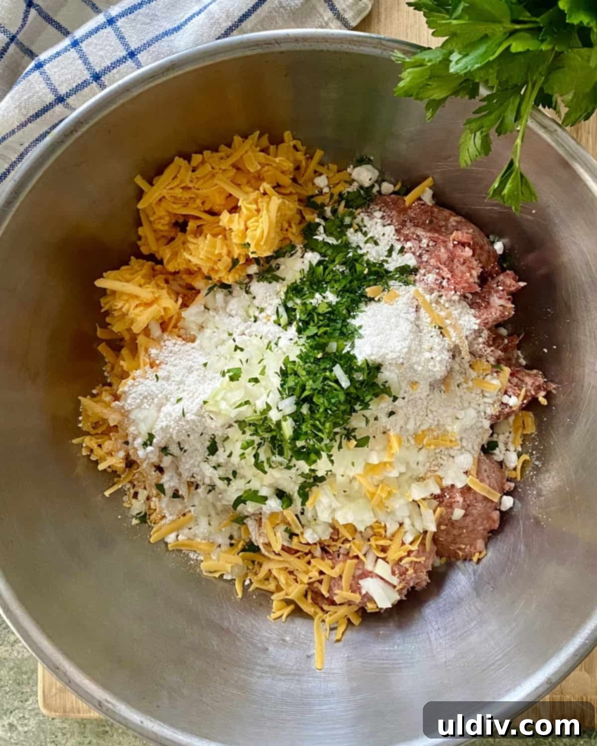 Grandma's Cheesy Bisquick Sausage Bites 5 A bowl with the ingredients for sausage and cheese balls.