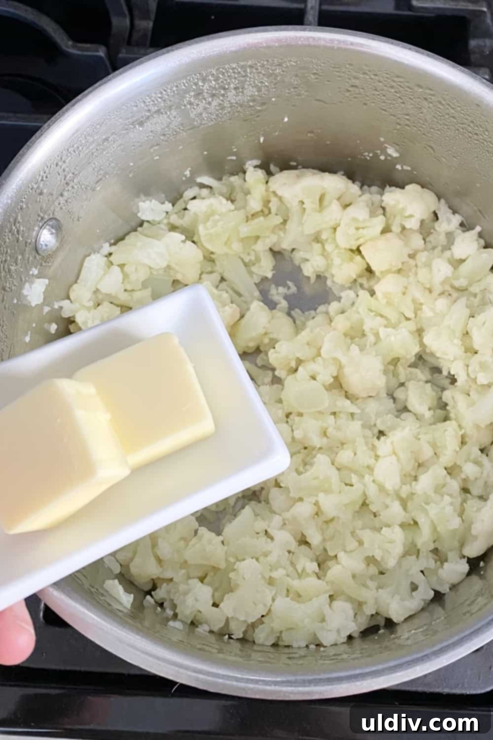 Cauliflower Cloud Shepherd's Pie 5 Adding butter to make mashed cauliflower.
