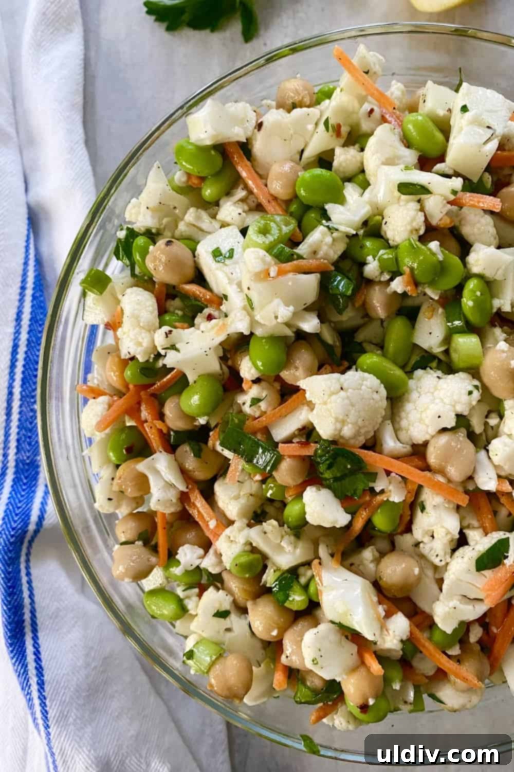 Wholesome Cauliflower Edamame Chickpea Salad 2 big bowl of raw cauliflower salad