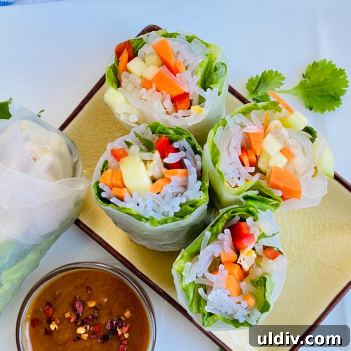 Fresh vegetables in rolls cut in half.