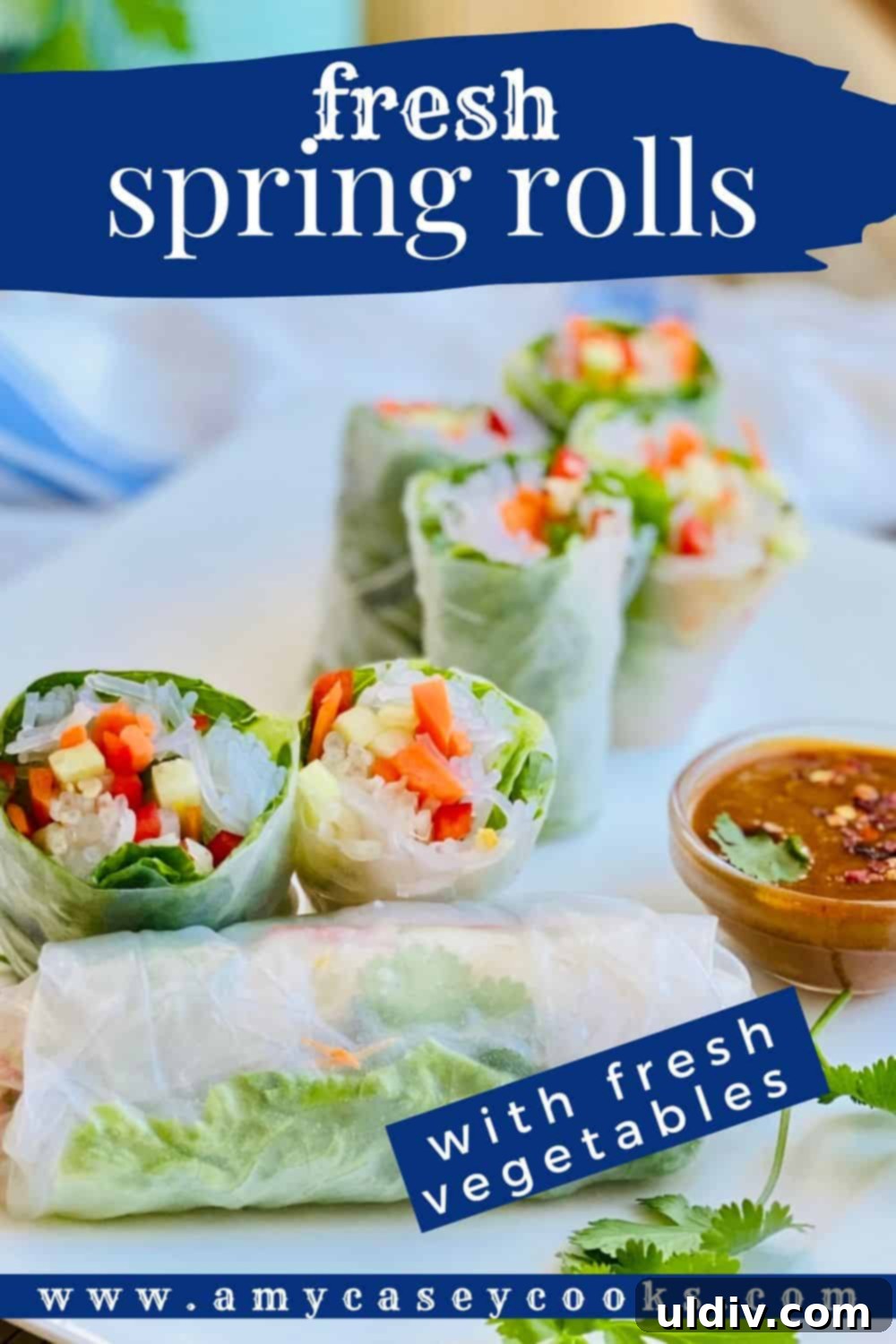 A large platter displaying both whole and halved fresh spring rolls, artfully arranged and ready to be served, highlighting their vibrant fillings.