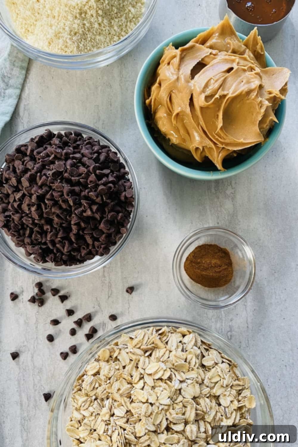 Decadent GlutenFree Peanut Butter Oat Bites 3 peanut butter, rolled oats, honey, mini chocolate chips, cinnamon