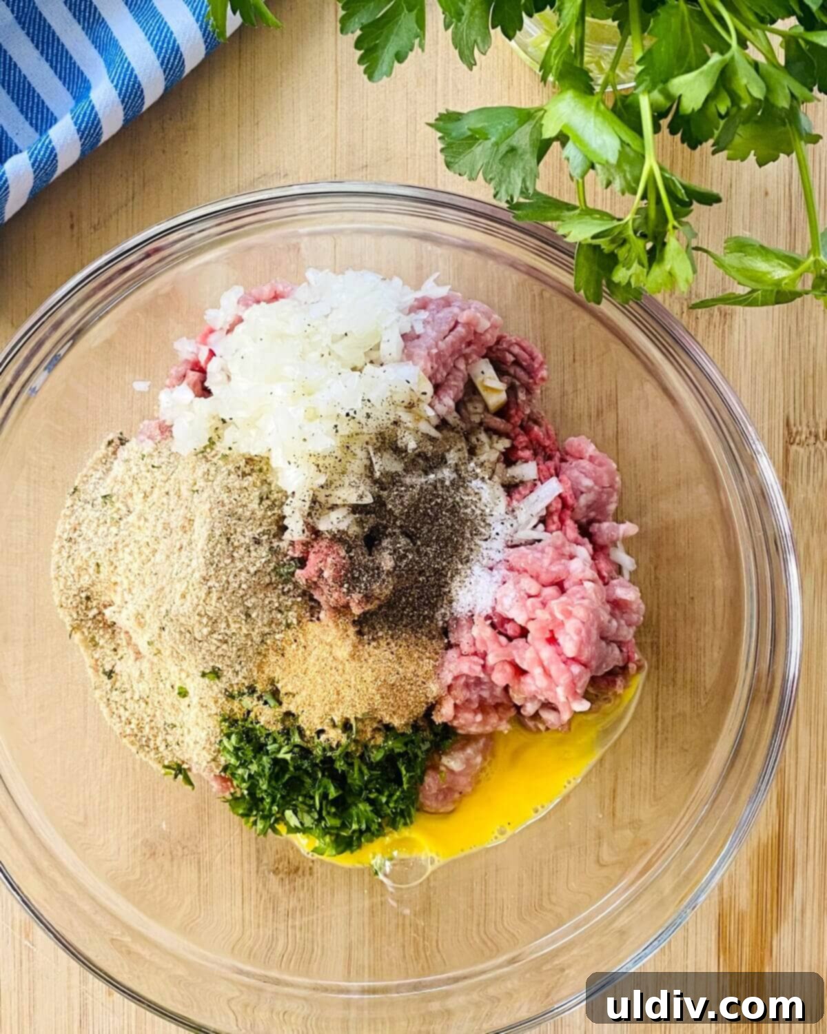 Quick and Easy Meatball Stroganoff 5 All the meatball ingredients combined in a large mixing bowl, ready for shaping.