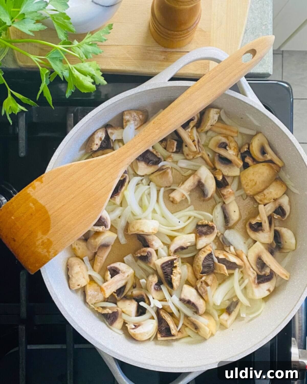 Effortless Homemade Meatball Stroganoff 8 Sautéing mushrooms and onions.