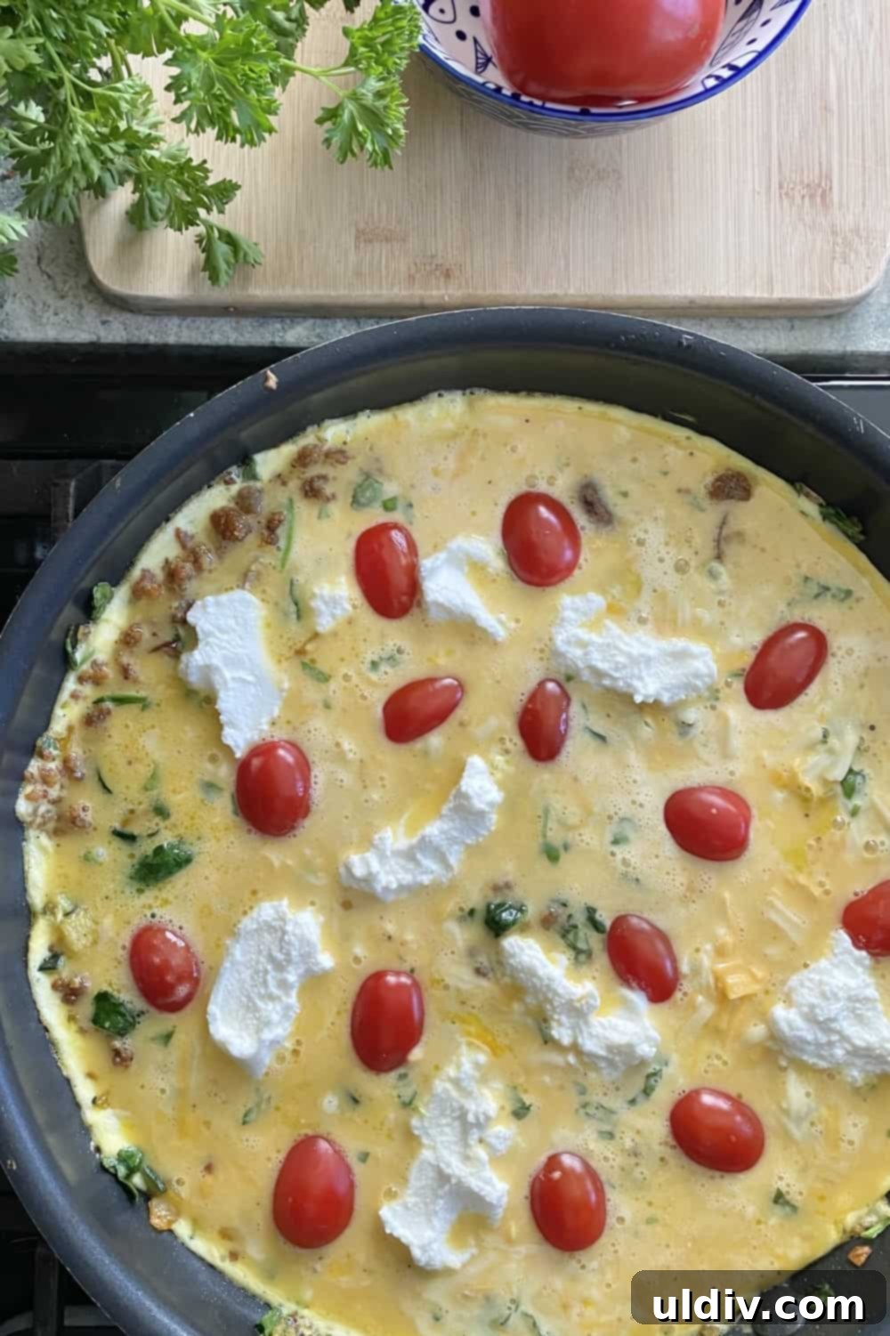 Effortless Baked Frittata 7 An unbaked frittata on a non stick pan.