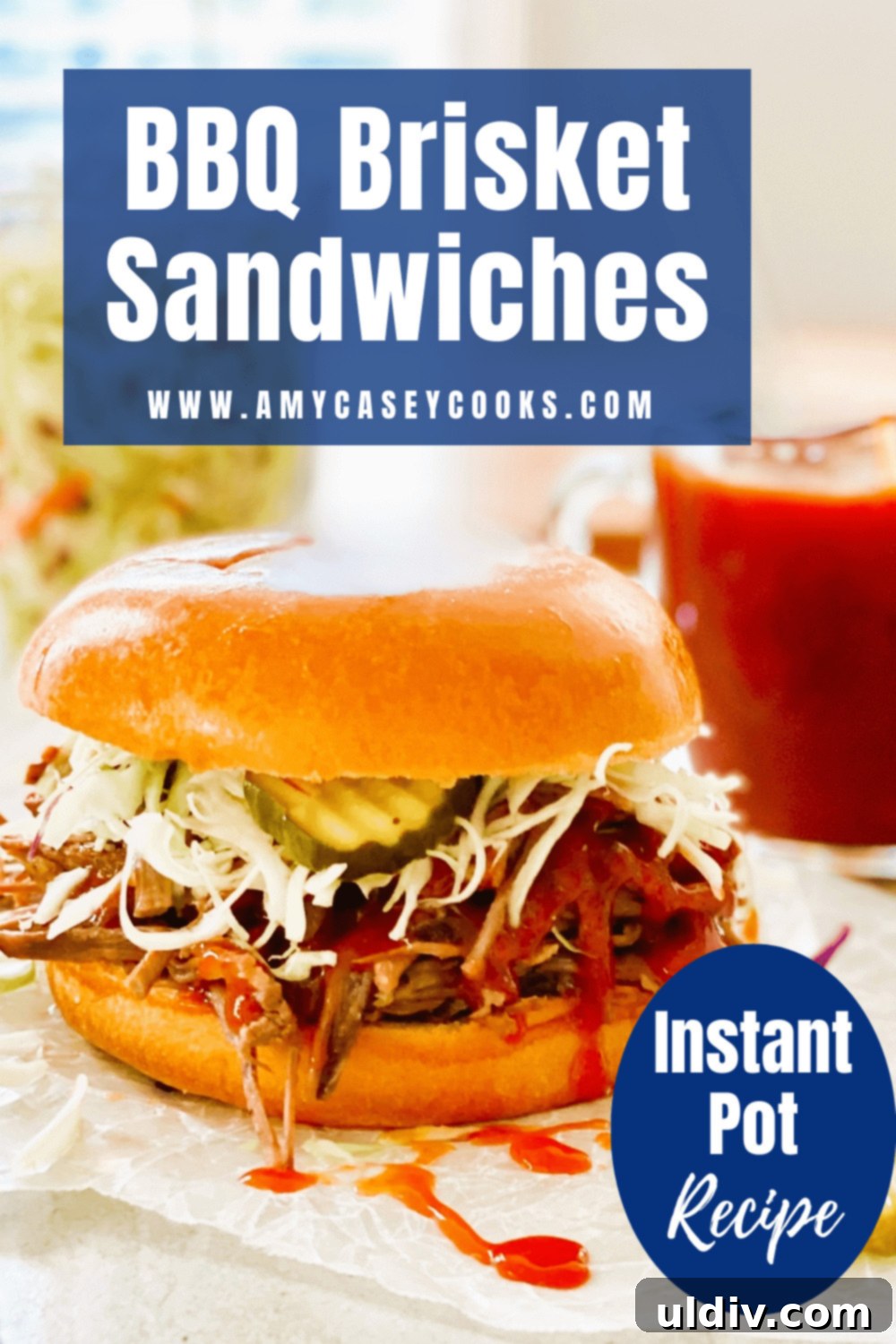 Tender Instant Pot BBQ Brisket Sandwiches 10 A delicious Instant Pot BBQ Brisket Sandwich overflowing with tender meat, coleslaw, and pickles, ready to be enjoyed.