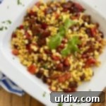 A close-up of the delicious sweet corn and bacon salad, showcasing its vibrant colors and inviting texture for a refreshing summer meal.