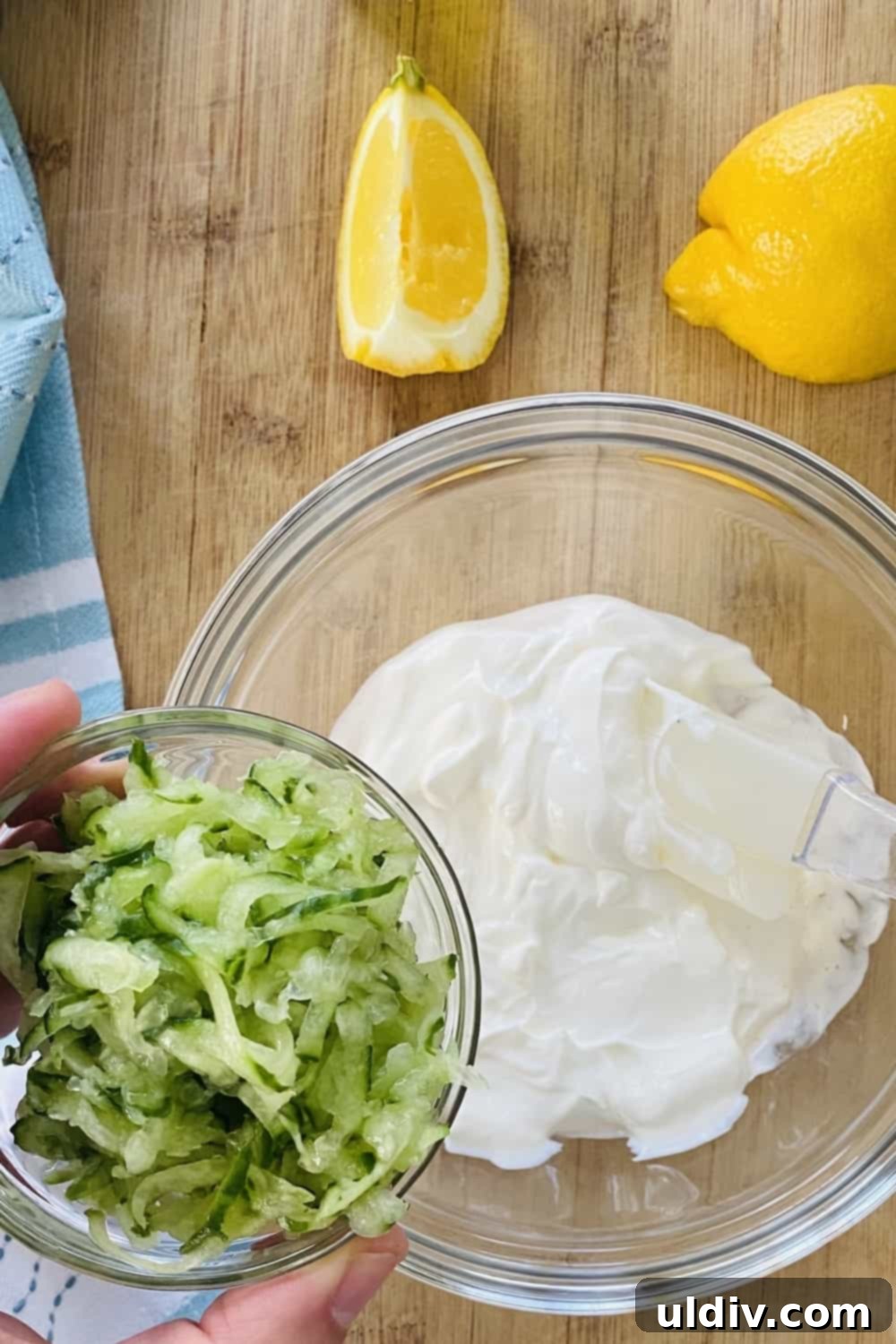 Versatile Easy Tzatziki Sauce 4 adding cucumber to yogurt