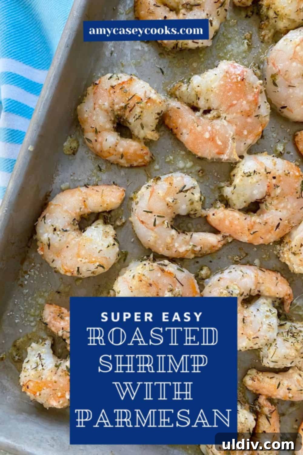 Crispy Parmesan Roasted Shrimp 10 Cooked shrimp with Parmesan and herbs on a sheet pan.