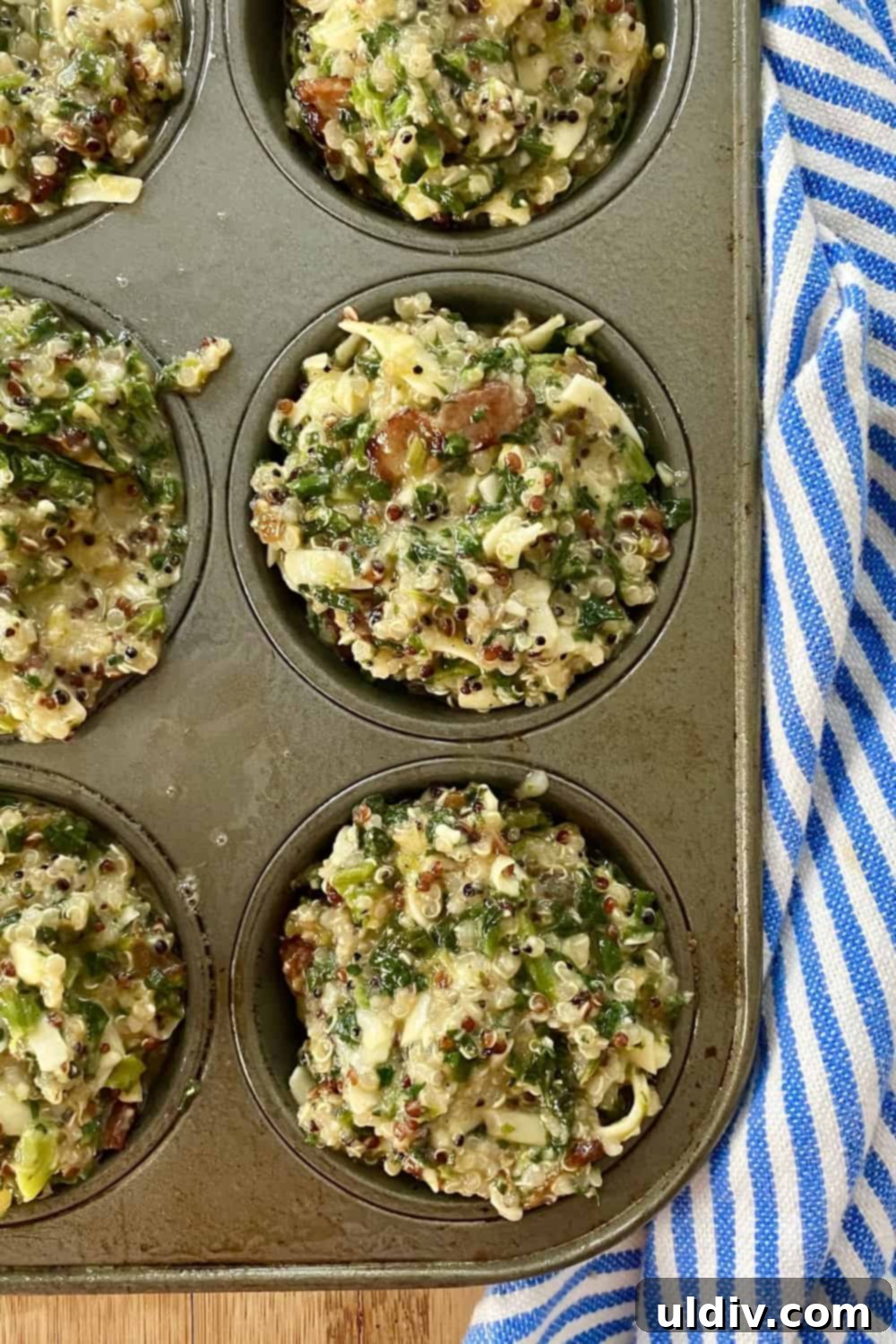 Your Grab-and-Go Morning: Protein-Packed Quinoa Egg Bites 7 Close-up of the quinoa and egg muffin mixture, ready to be scooped into the muffin pan.