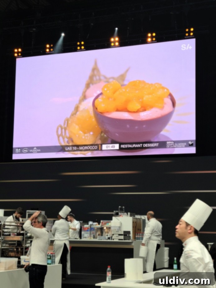 2023 Pastry World Cup: The Quest for Sweet Supremacy 4 A chef meticulously working on a delicate pastry creation during the intense competition.