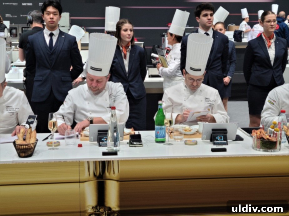Bocuse d'Or 2023: From Hawaii to France, A Gastronomic Odyssey 12 Judges meticulously evaluating a dish at the Bocuse d'Or