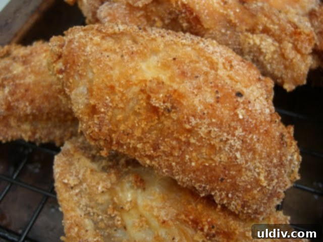 Crispy Skillet Chicken Wings 4 A tempting pile of golden, pan-fried mini wings ready to be devoured.