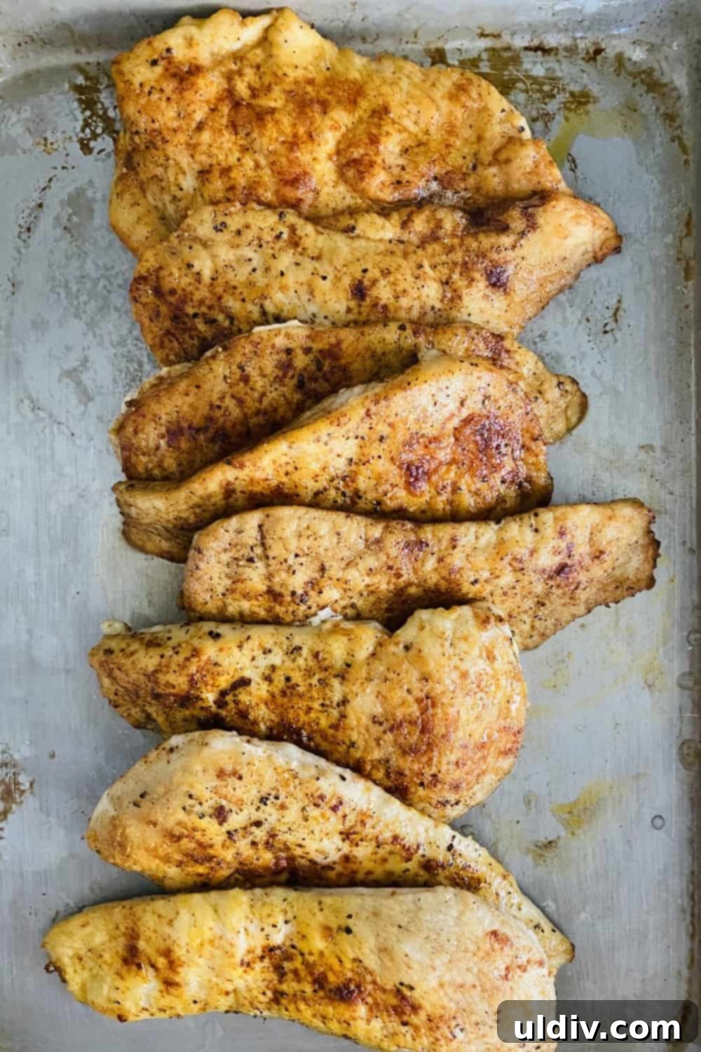Pan-Seared Chicken with a Sun-Kissed Tomato, Wine & Basil Reduction 5 butter sautéed chicken breast
