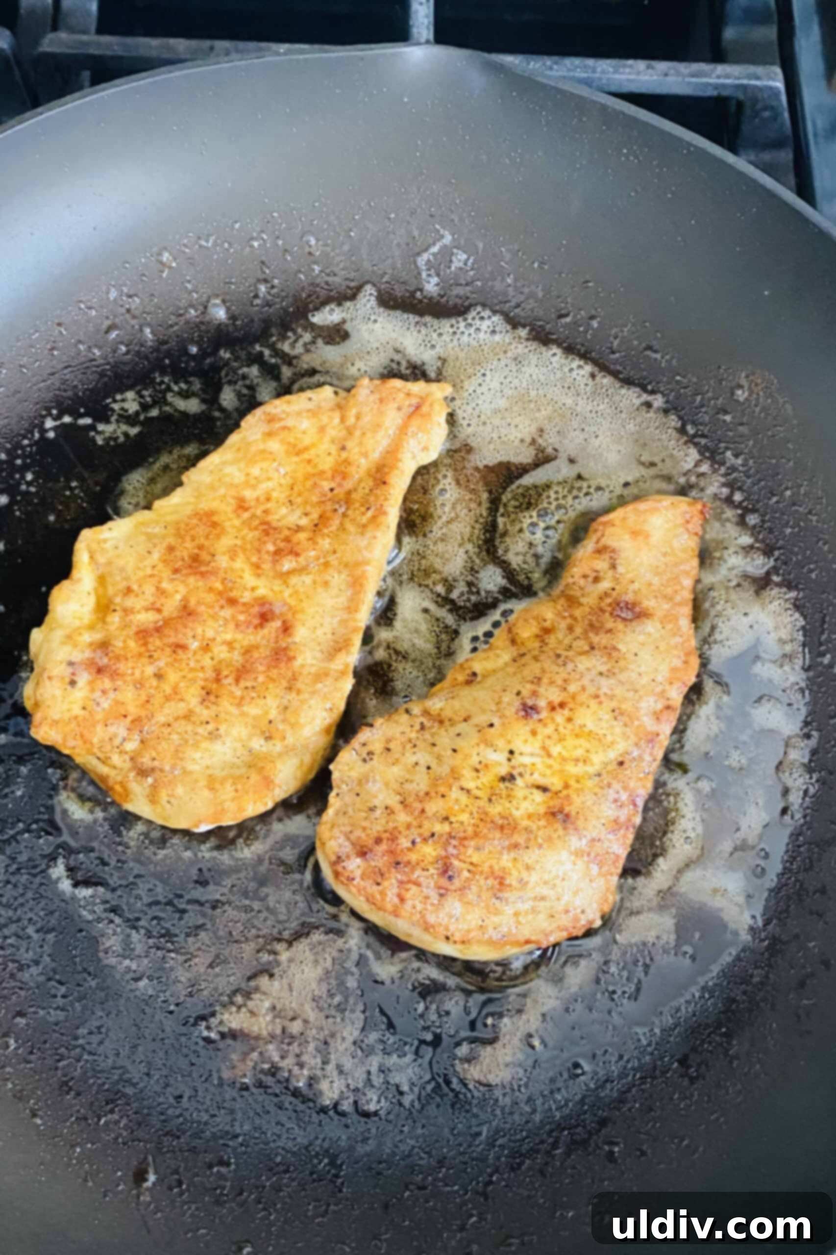 Golden Pan Seared Chicken with Sun Ripened Tomato Wine Basil Sauce 9 Sautéing chicken in butter and olive oil for perfect results