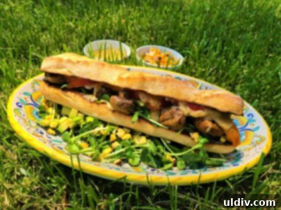 La Brea Bakery Summer Grilling: Say Yes to Seasonal, Vibrant Deliciousness! 6 Close-up of a vegan grilled sandwich filled with vegetables and sauce