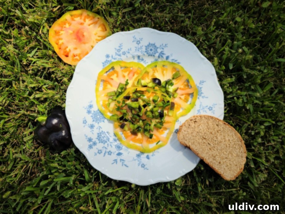Beyond the Grid An Interview with the ForkYeahFoodies Community 3 A simple yet evocative dish of fresh bread and ripe tomatoes, representing childhood culinary memories.