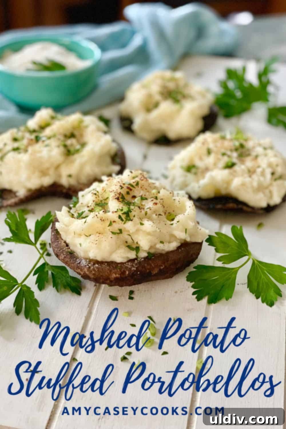 Savory Mashed Potato Portobello Caps 11 Four vegetarian stuffed portobello mushrooms, beautifully garnished and ready to be served.