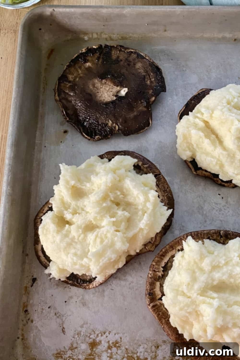 Savory Mashed Potato Portobello Caps 8 A spoon stuffing roasted mushroom caps with creamy mashed potatoes.