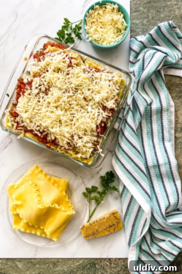 Hearty Spinach and Sausage Lasagna 2 an assembled and unbaked layered Italian pasta dish ready for baking