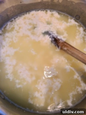 The Sour Milk Secret Homemade Cheese and Happy Memories 3 Curdled milk in a pot, showing clear separation of curds and whey