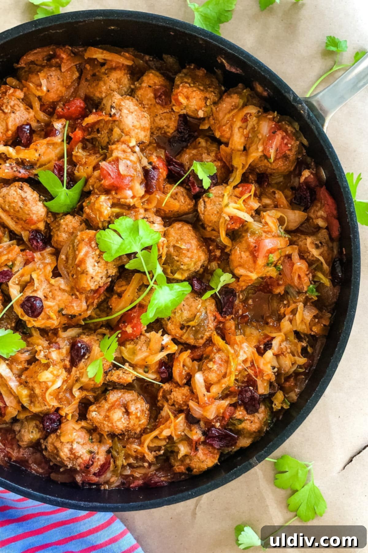 Cabbage Roll Meatball Bake 2 Skillet filled with delicious Cabbage Roll Meatballs simmering in a rich tomato sauce