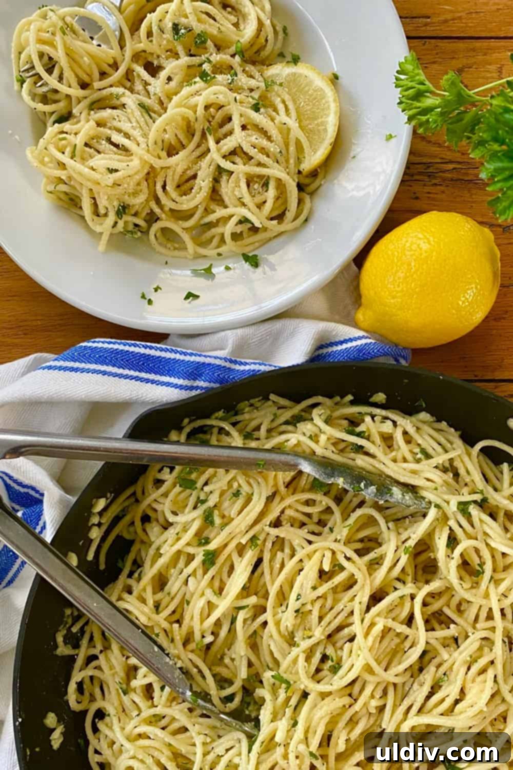 Creamy Garlic Parmesan Noodles 3 a saute pan and a serving of buttered noodles with Parmesan