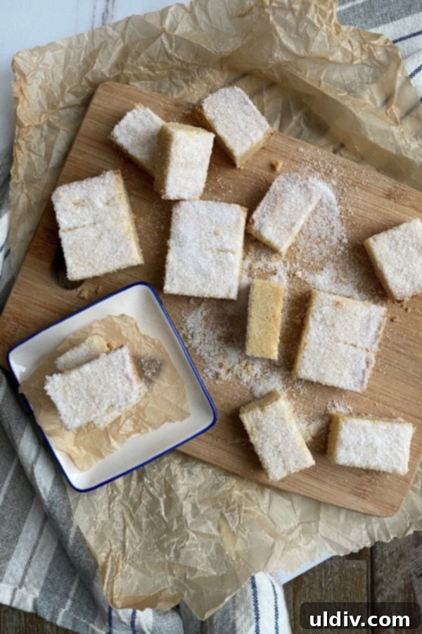 Gourmet Sugared Shortbread 4 Freshly baked sugared shortbread, cut into individual pieces in a baking pan.