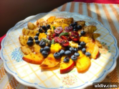 Ponti: A Culinary Symphony of Heritage and Future 5 A vibrant fruit salad featuring an assortment of fresh summer berries and melon, ready to be enhanced.