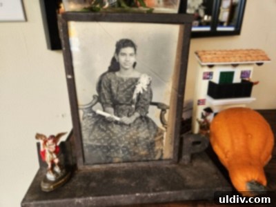 A warm portrait of Chef Roldan’s mother, Marina, welcoming guests to Marina's Bistro and Rum Bar