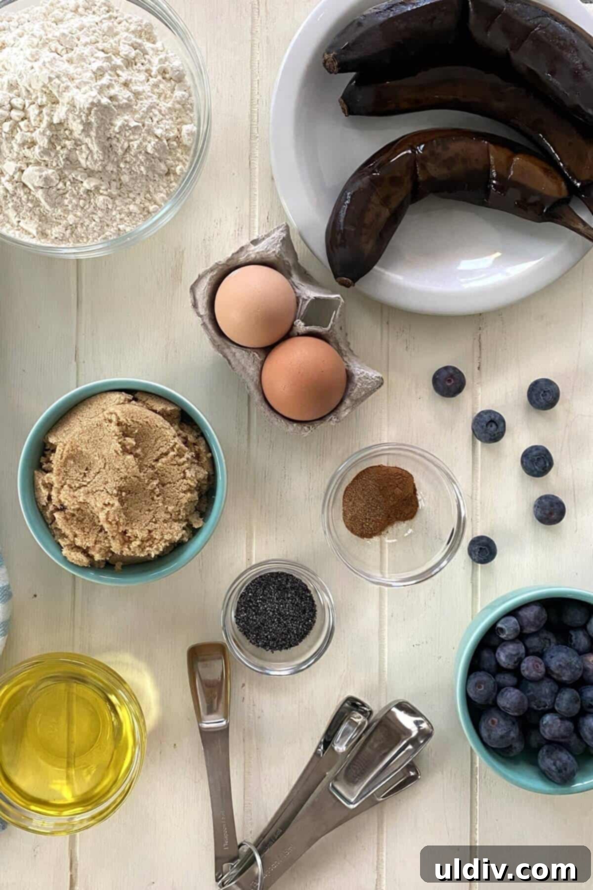 Mediterranean Olive Oil Banana & Blueberry Loaf 3 black bananas, flour, brown sugar, eggs, blueberries, olive oil, poppy seeds.