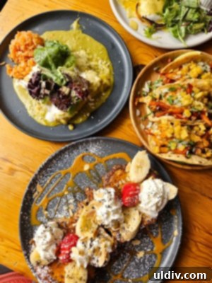 Savoring Amerikas A Delicious Dive into Nuevo Latino Flavors 2 Amerikas restaurant exterior facade showcasing a modern, inviting entrance with natural light.