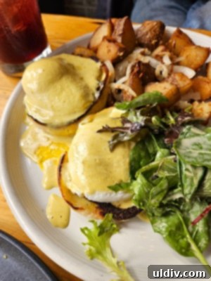 Savoring Amerikas A Delicious Dive into Nuevo Latino Flavors 6 Eggs Benedict with hollandaise sauce and roasted potatoes with chorizo and serrano peppers.