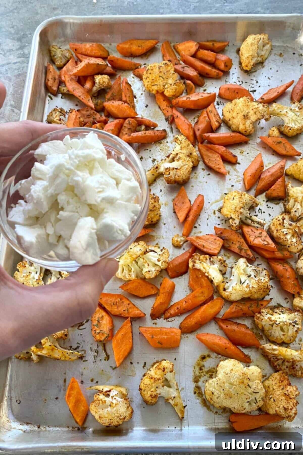 Honey-Glazed Roasted Carrots and Cauliflower with Tangy Goat Cheese 7 Scattering crumbled goat cheese over honey-drizzled roasted vegetables.