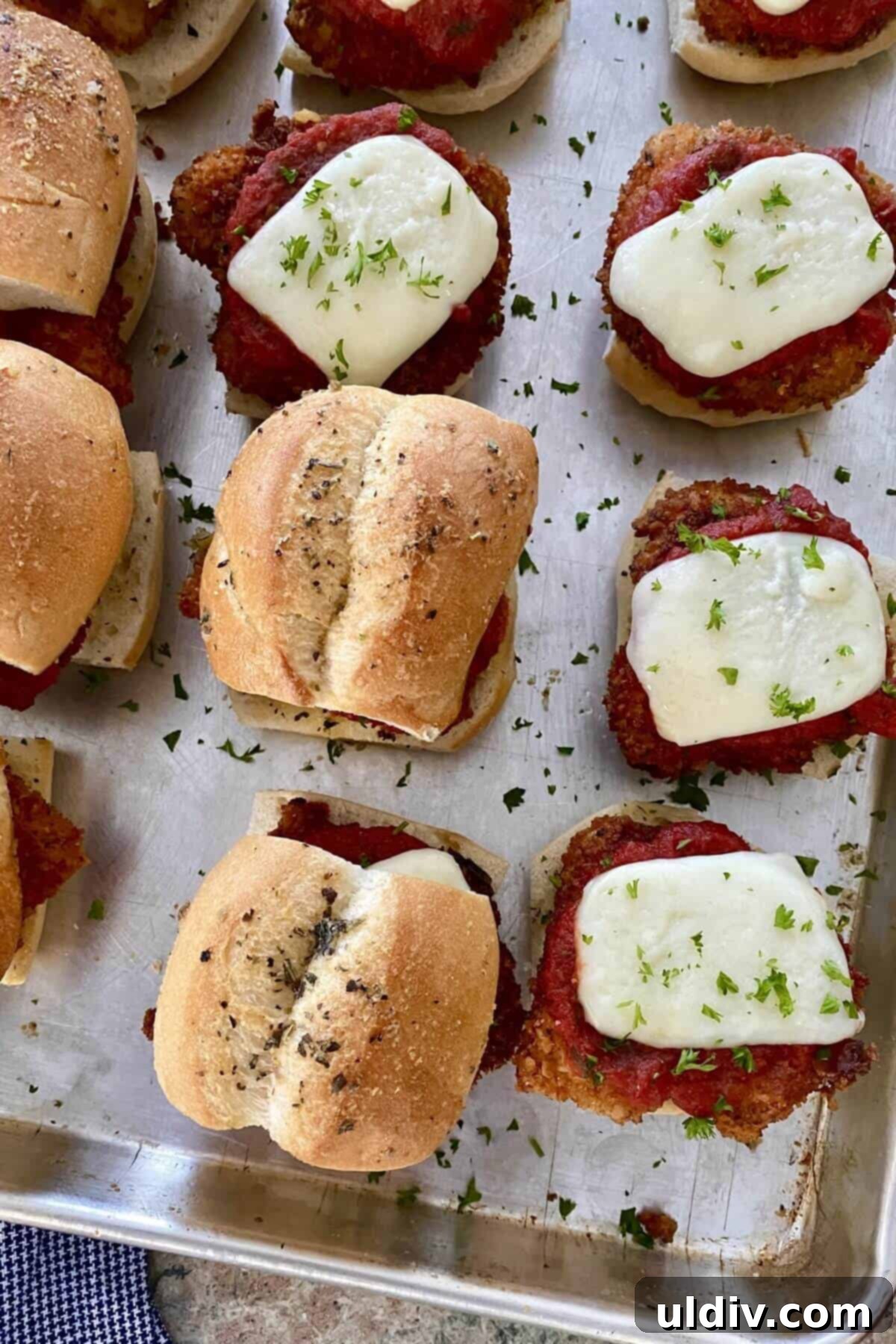 Mini Chicken Parm Sliders 7 Mini chicken parm sandwiches with perfectly melted mozzarella cheese.