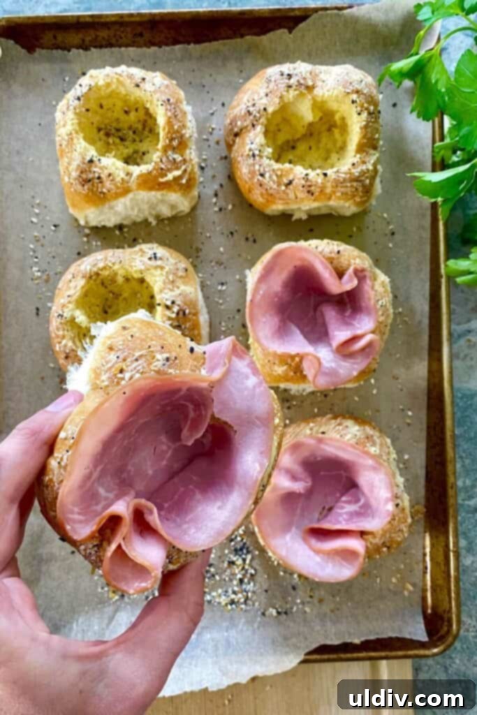 Ham and Egg Bread Bowls 6 Hollowed bread bowls lined with slices of deli ham, forming cups for the fillings.