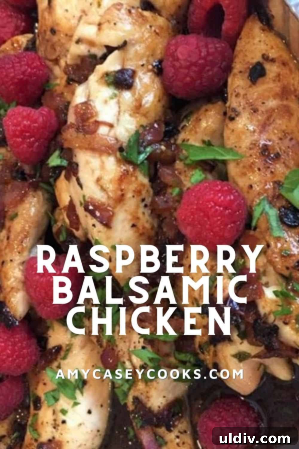 Raspberry Glazed Chicken with Toasted Almonds 4 Exquisite chicken tenderloins glazed with a shimmering raspberry jam and balsamic vinegar sauce, ready for a gourmet dining experience.